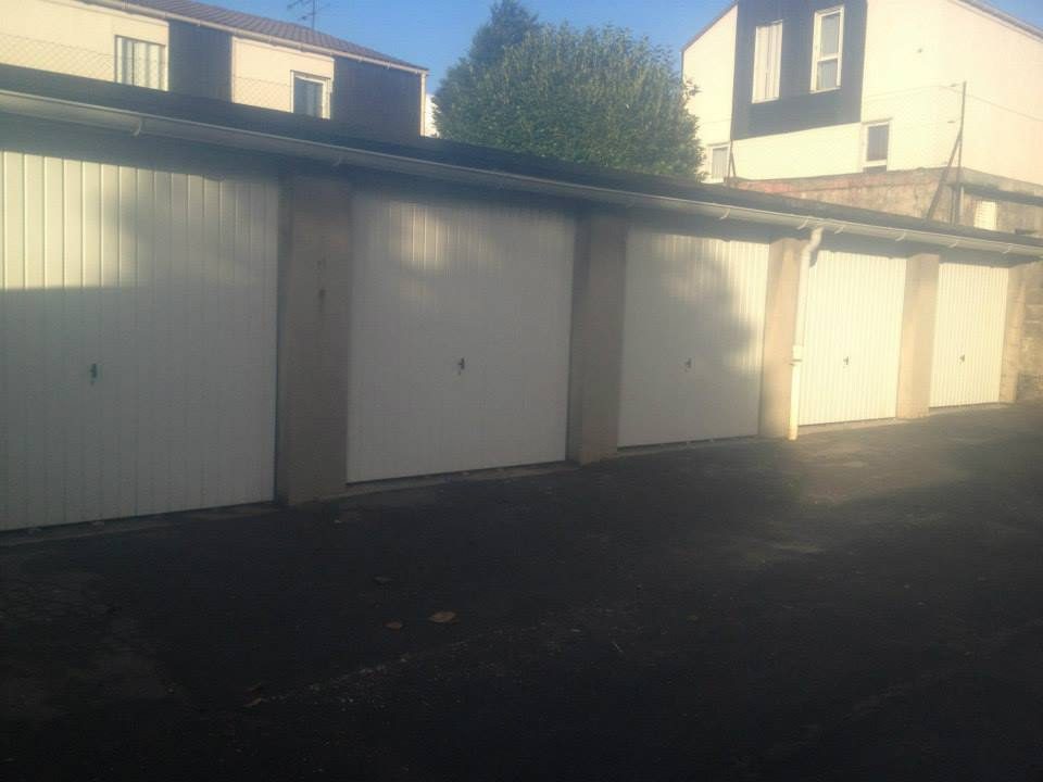 Porte garage basculante pose maison traditionnelle essonne