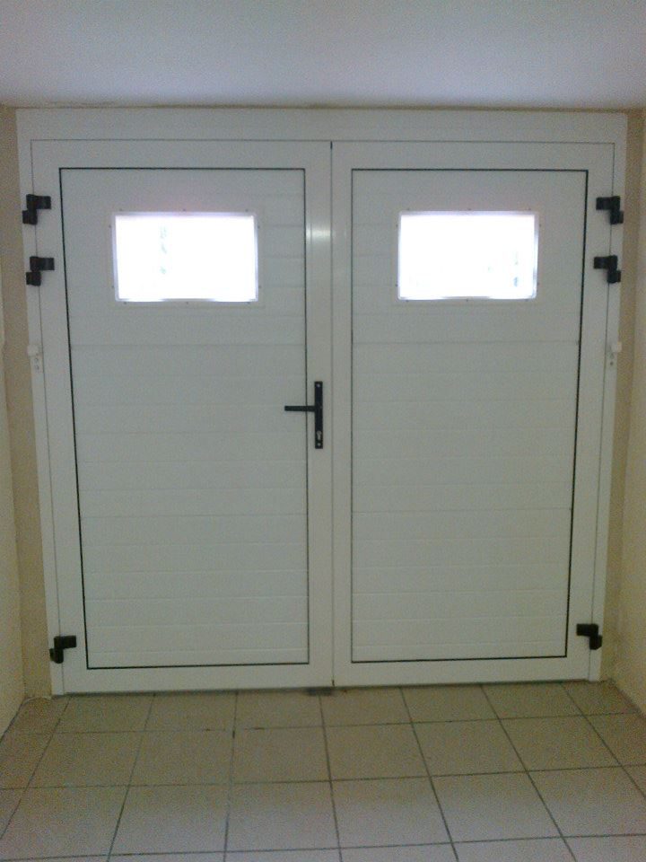 Porte garage battante aluminium pose maison pierre ile de france