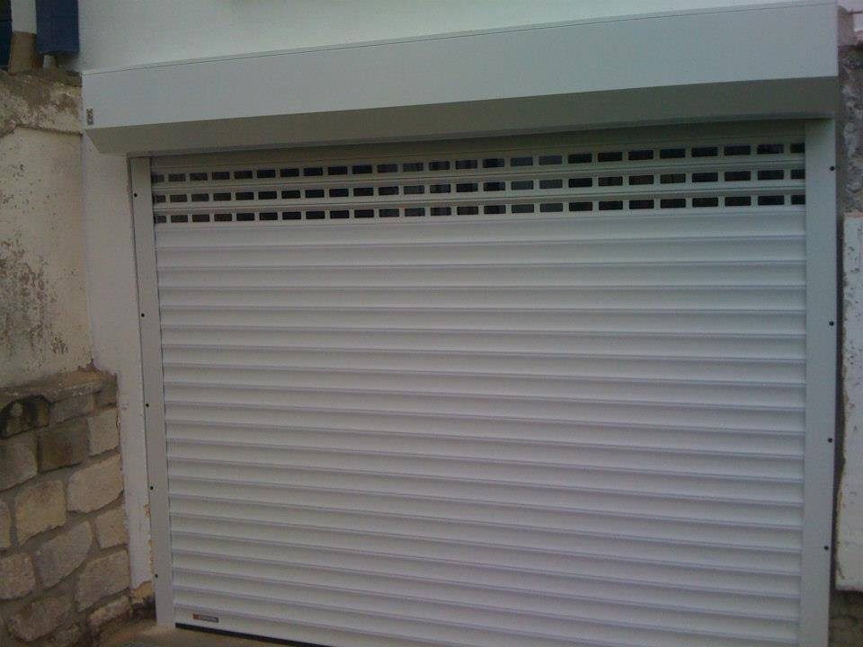 Porte garage enroulable ton bois pose maison neuve region parisienne