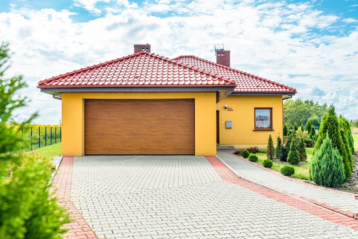 Porte garage sectionnelle ton bois chene dore