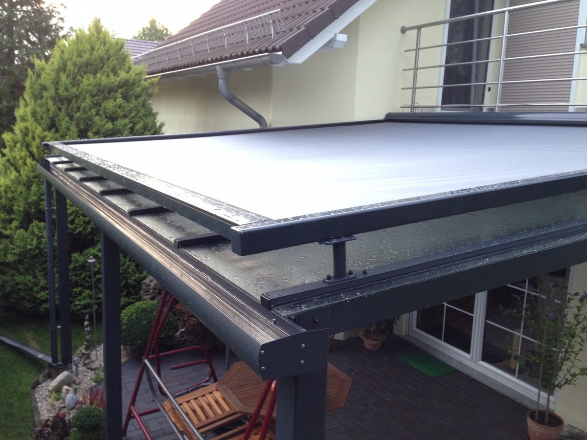 Store veranda terrasse couverte pose Seine-et-Marne