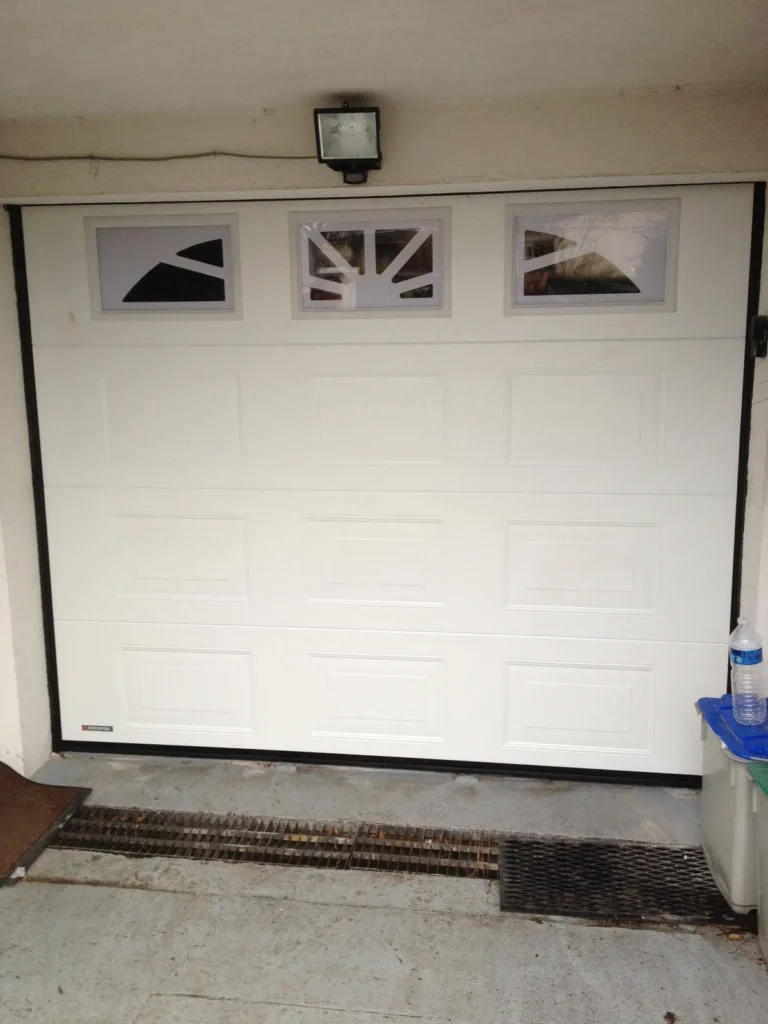 Porte de garage sectionnelle sur mesure - réalisation Val-d’Oise (Île-de-France)